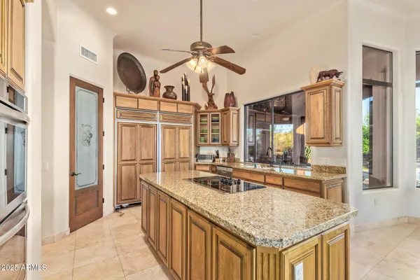 a bathroom with a sink a mirror and toilet