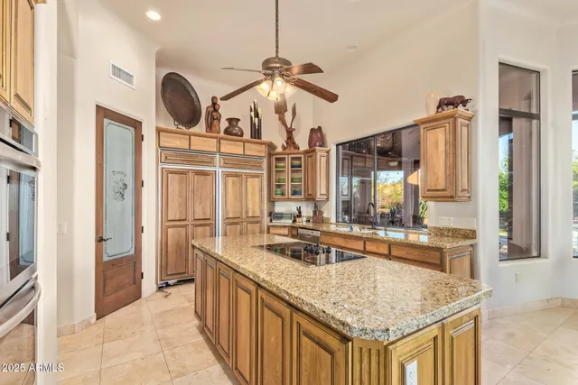 a bathroom with a sink a mirror and toilet