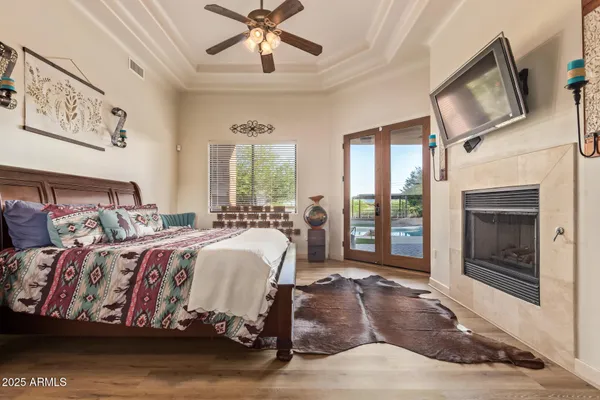 a bedroom with a bed and a table