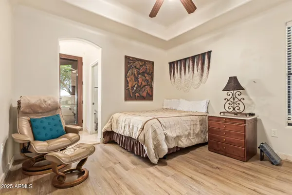 a utility room with stainless steel appliances granite countertop a sink and a cabinets