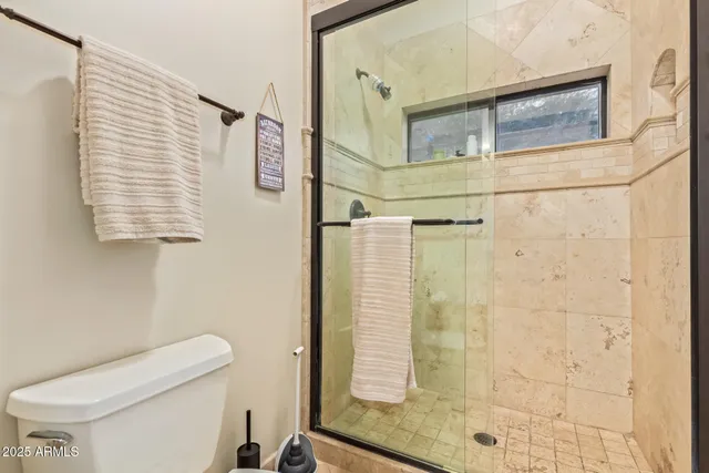 a view of a chairs and table in patio