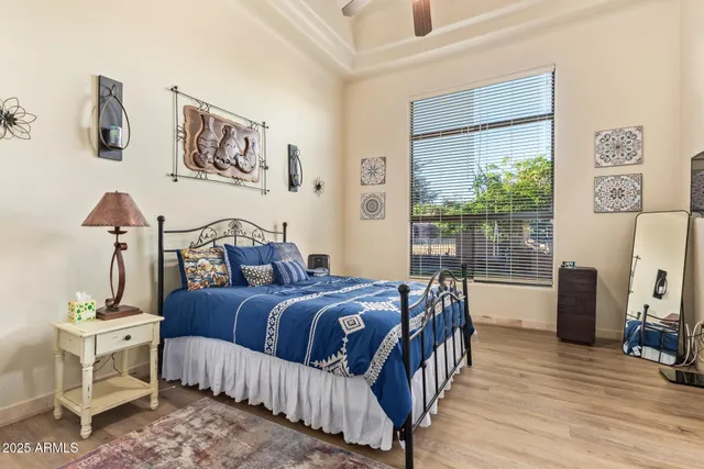 a front view of a house with a yard and a garage