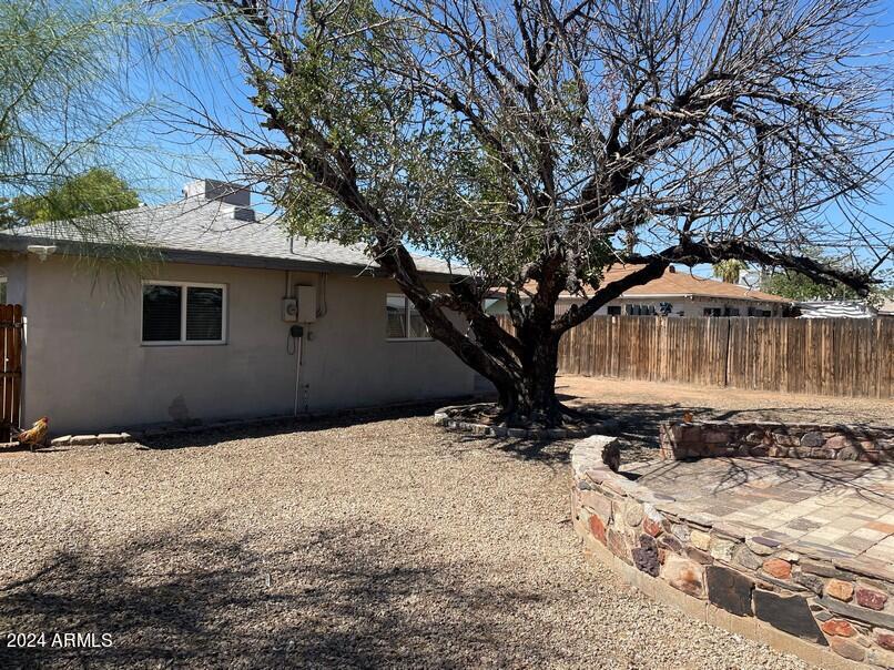 3111 North 34th Street Phoenix, AZ 85018 - Photo 15 of 15 a front view of a house with a yard