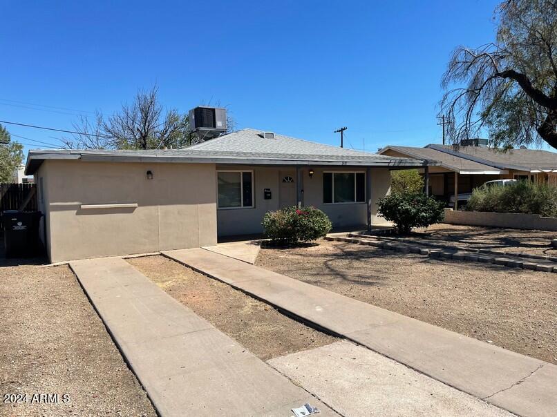 3111 North 34th Street Phoenix, AZ 85018 - Photo 2 of 15 a view of a house with sitting area and potted plants
