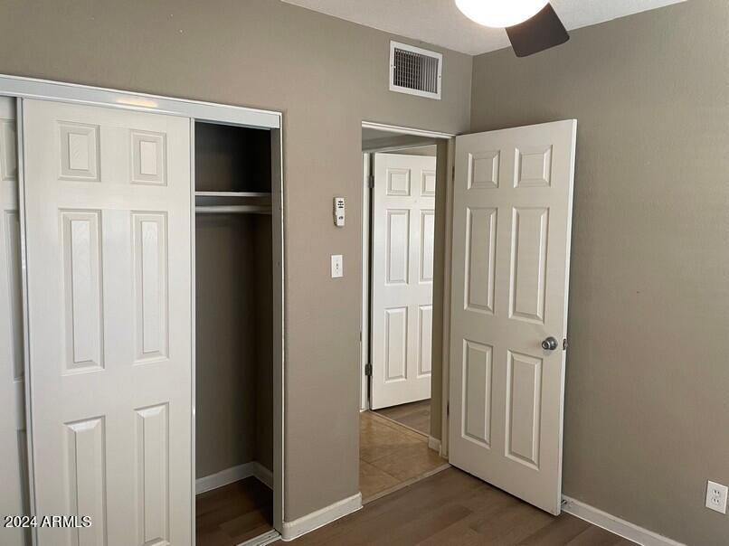 3111 North 34th Street Phoenix, AZ 85018 - Photo 10 of 15 a view of a hallway with wooden floor and entryway