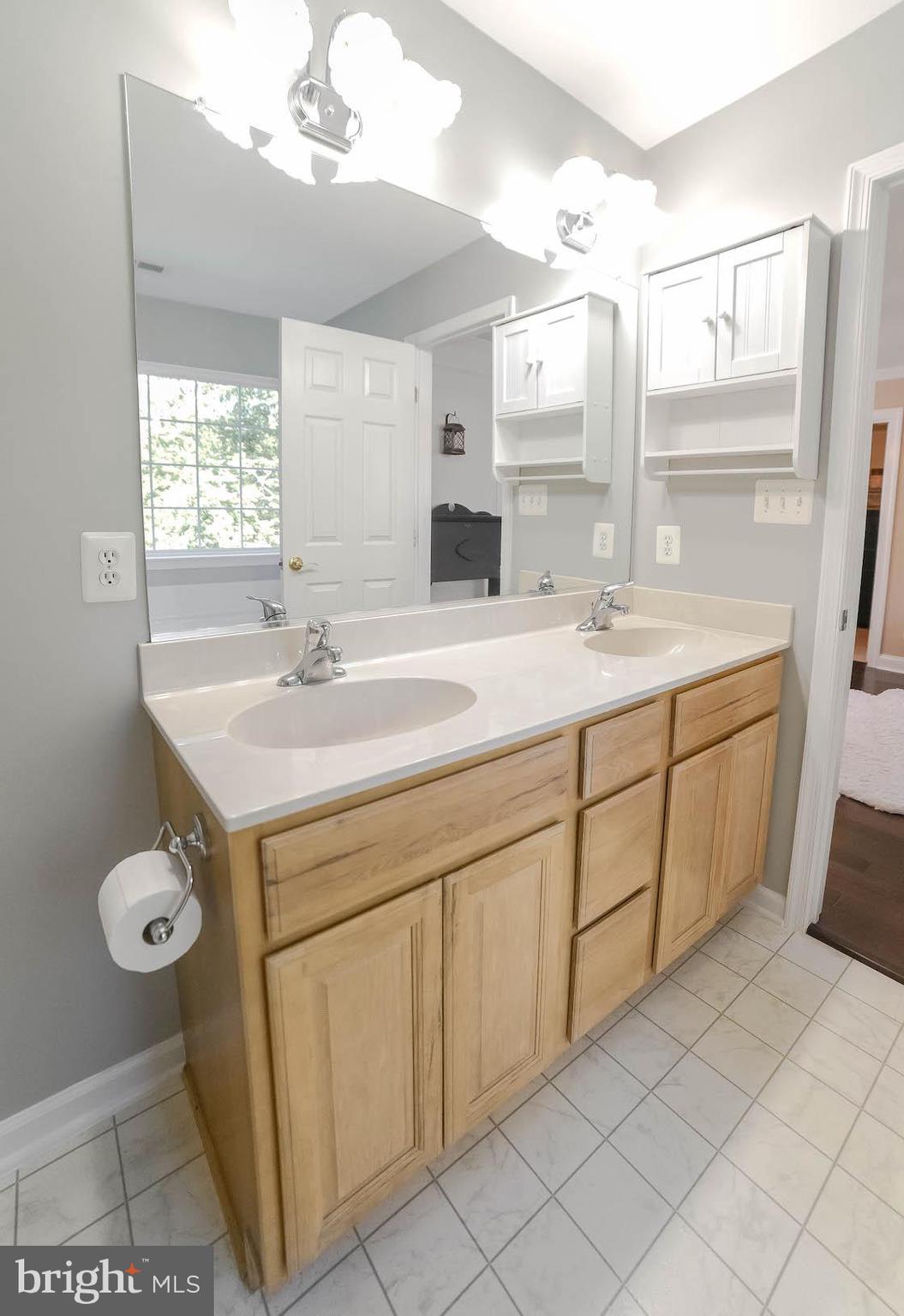 1760 Rudolph Lane Lusby, MD 20657 - Photo 34 of 65 Dual sink vanity in primary bath