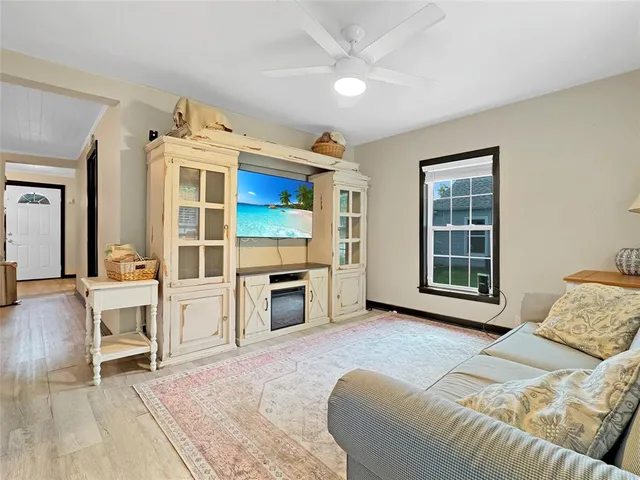 a bedroom with furniture and a fireplace