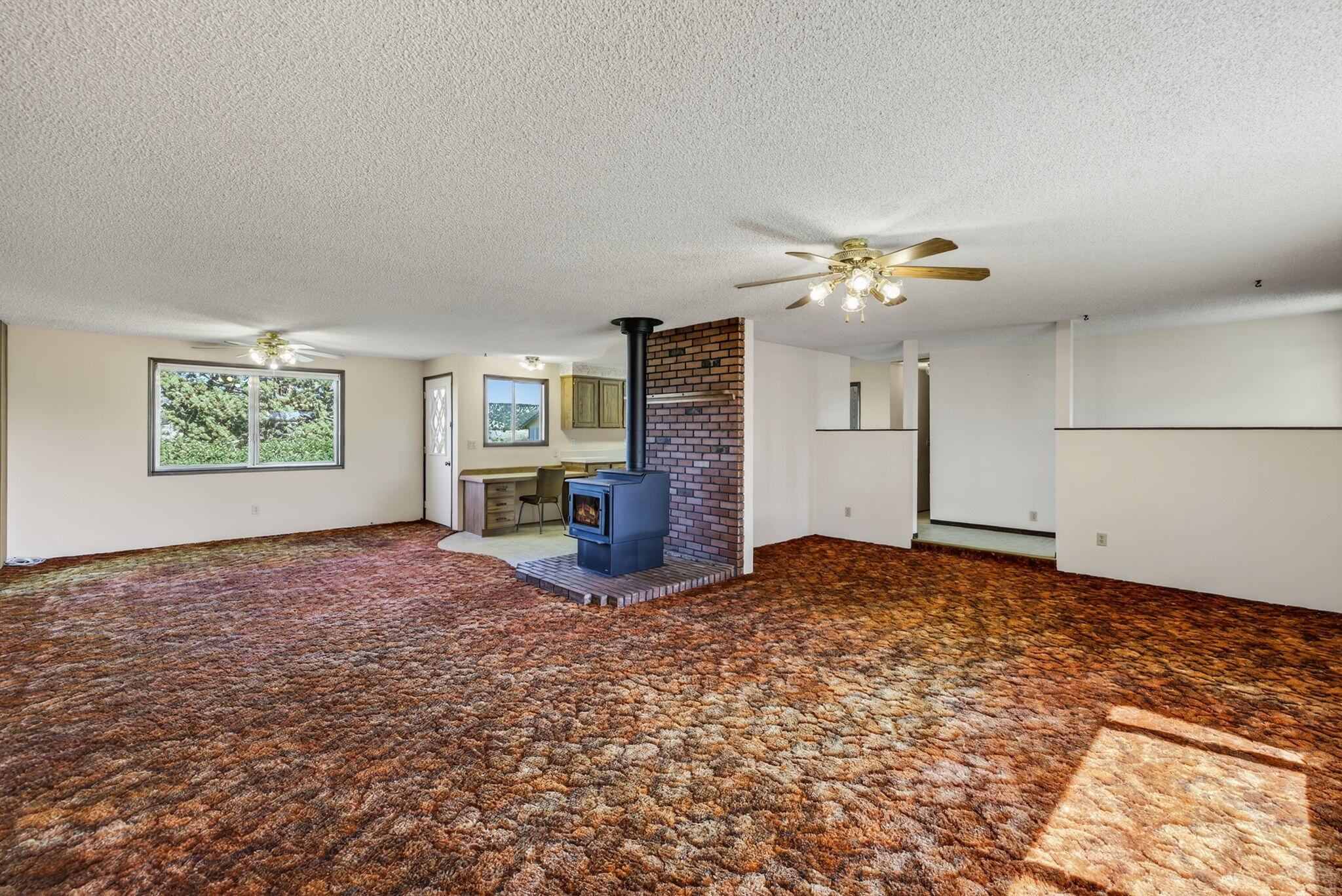 951 Southeast Rancho Lane Madras, OR 97741 - Photo 8 of 48 Dining Area/Living Room w/ Wood Stove