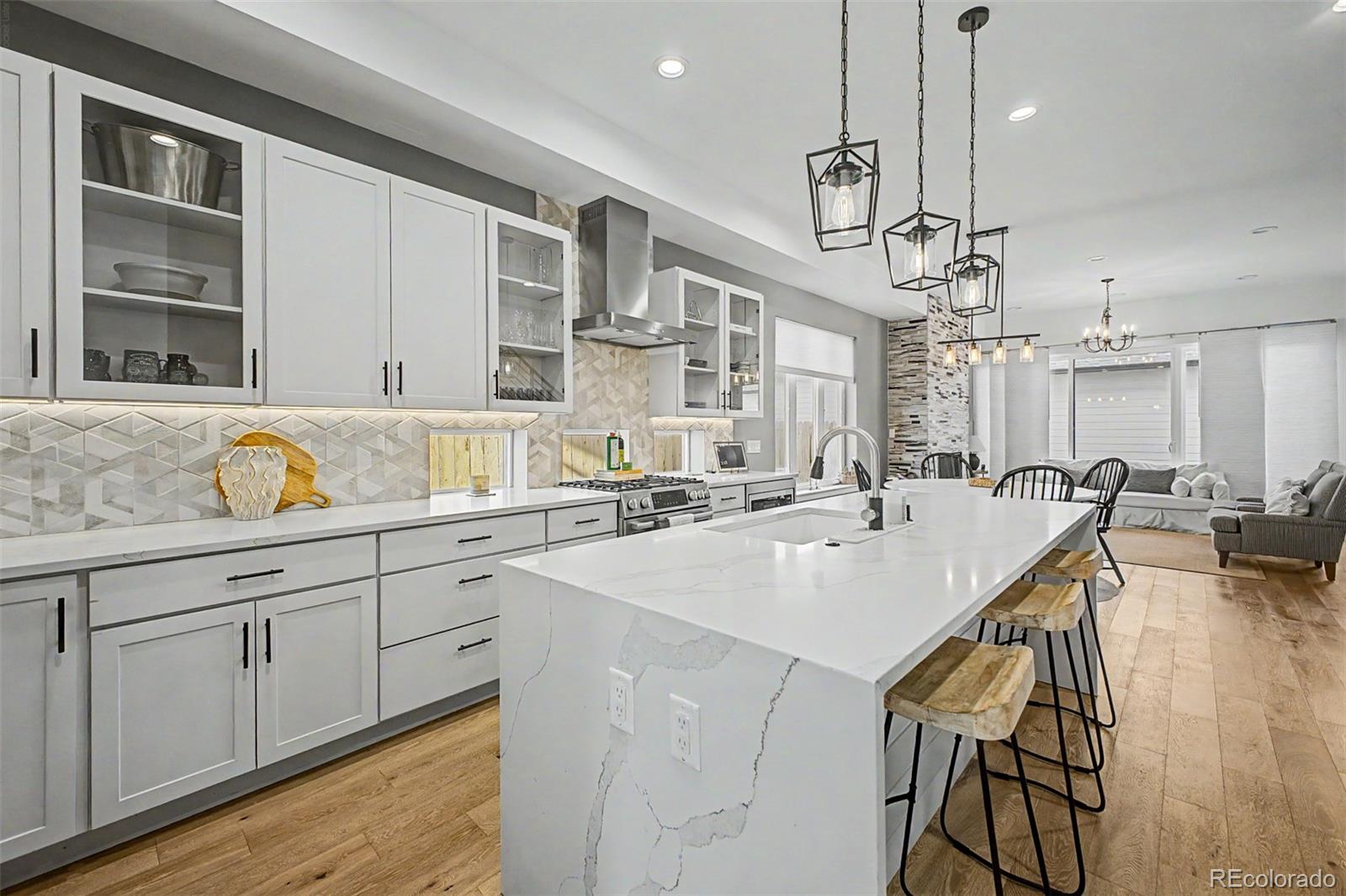 8 South Colorado Boulevard Denver, CO 80246 - Photo 1 of 40 a kitchen with a sink a counter space appliances and cabinets