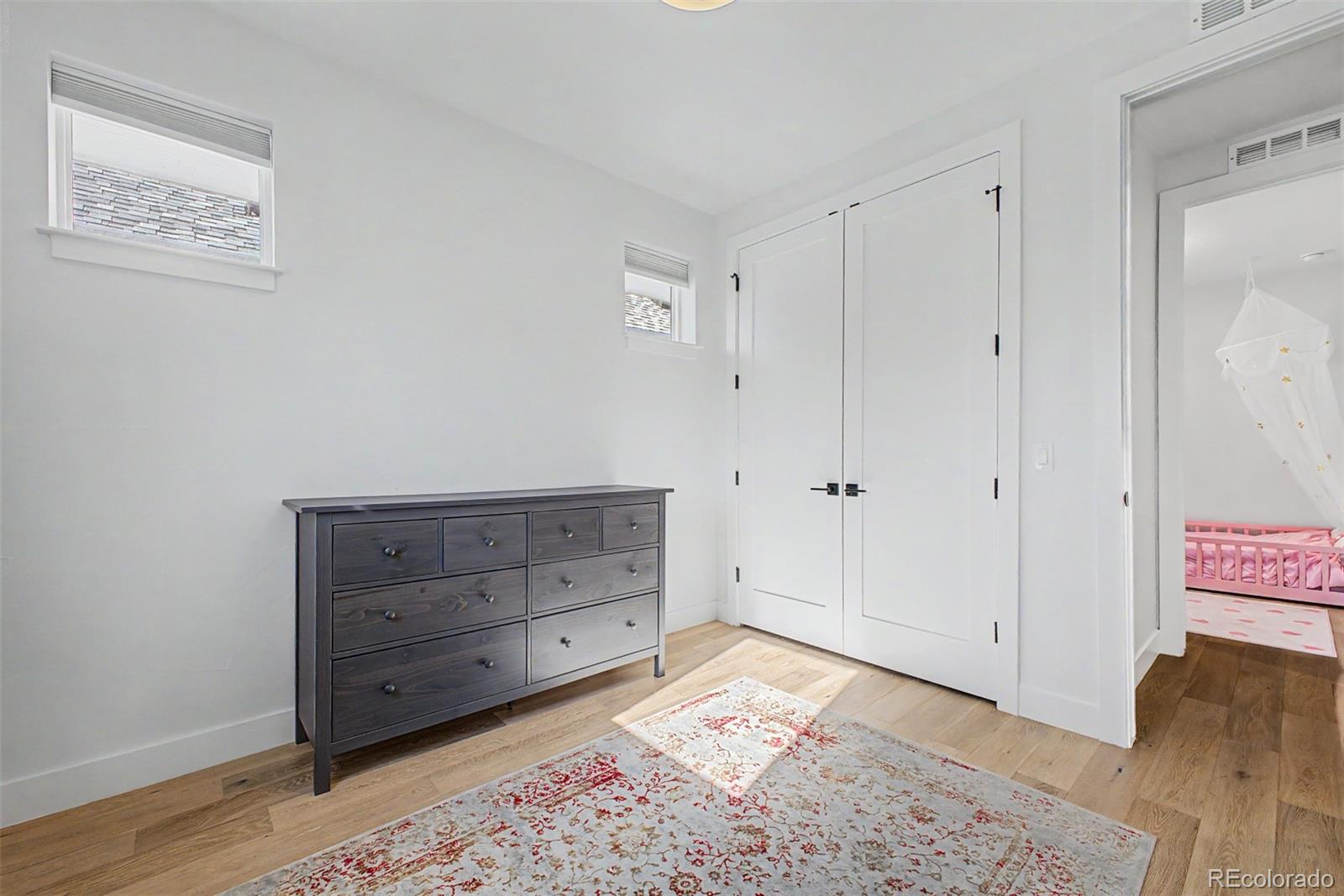 8 South Colorado Boulevard Denver, CO 80246 - Photo 17 of 40 a view of room with cabinet