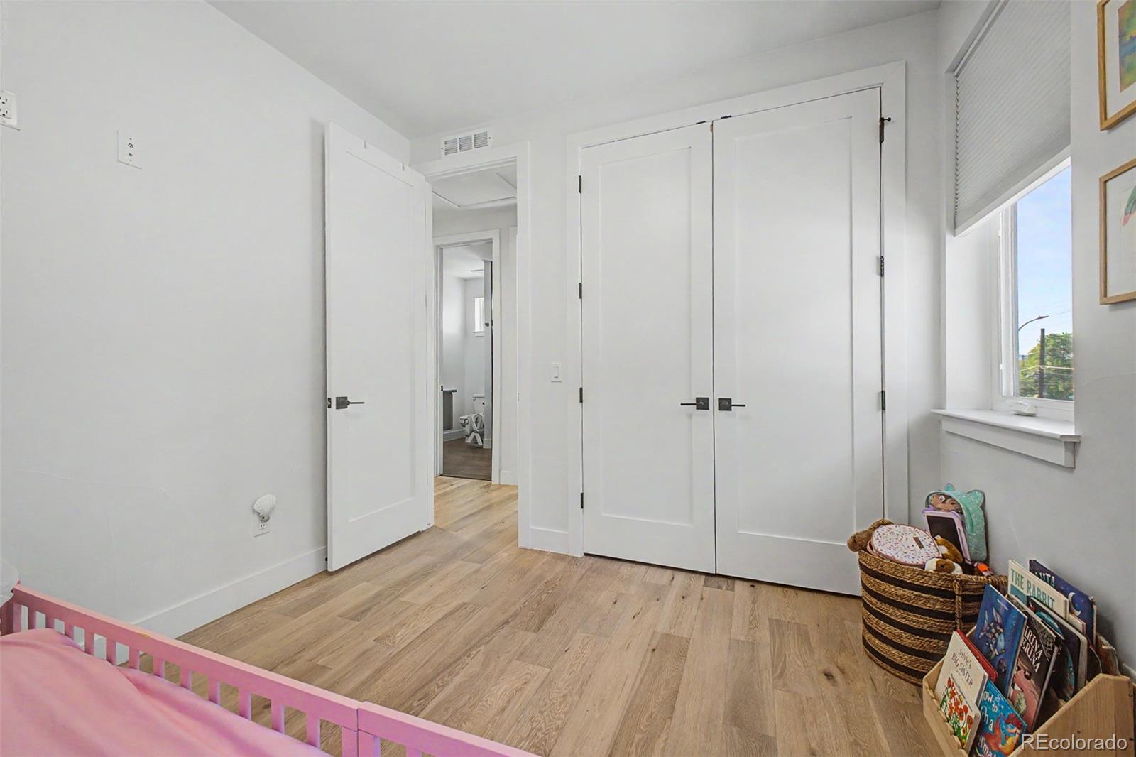 8 South Colorado Boulevard Denver, CO 80246 - Photo 20 of 40 a view of room with wooden floor