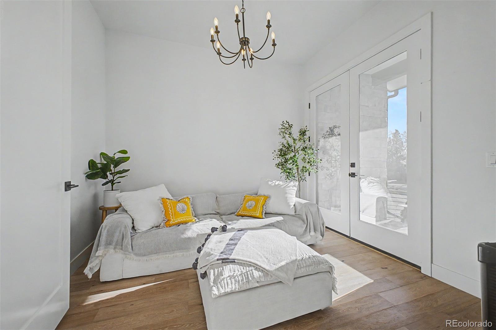 8 South Colorado Boulevard Denver, CO 80246 - Photo 9 of 40 a bedroom with a bed and window