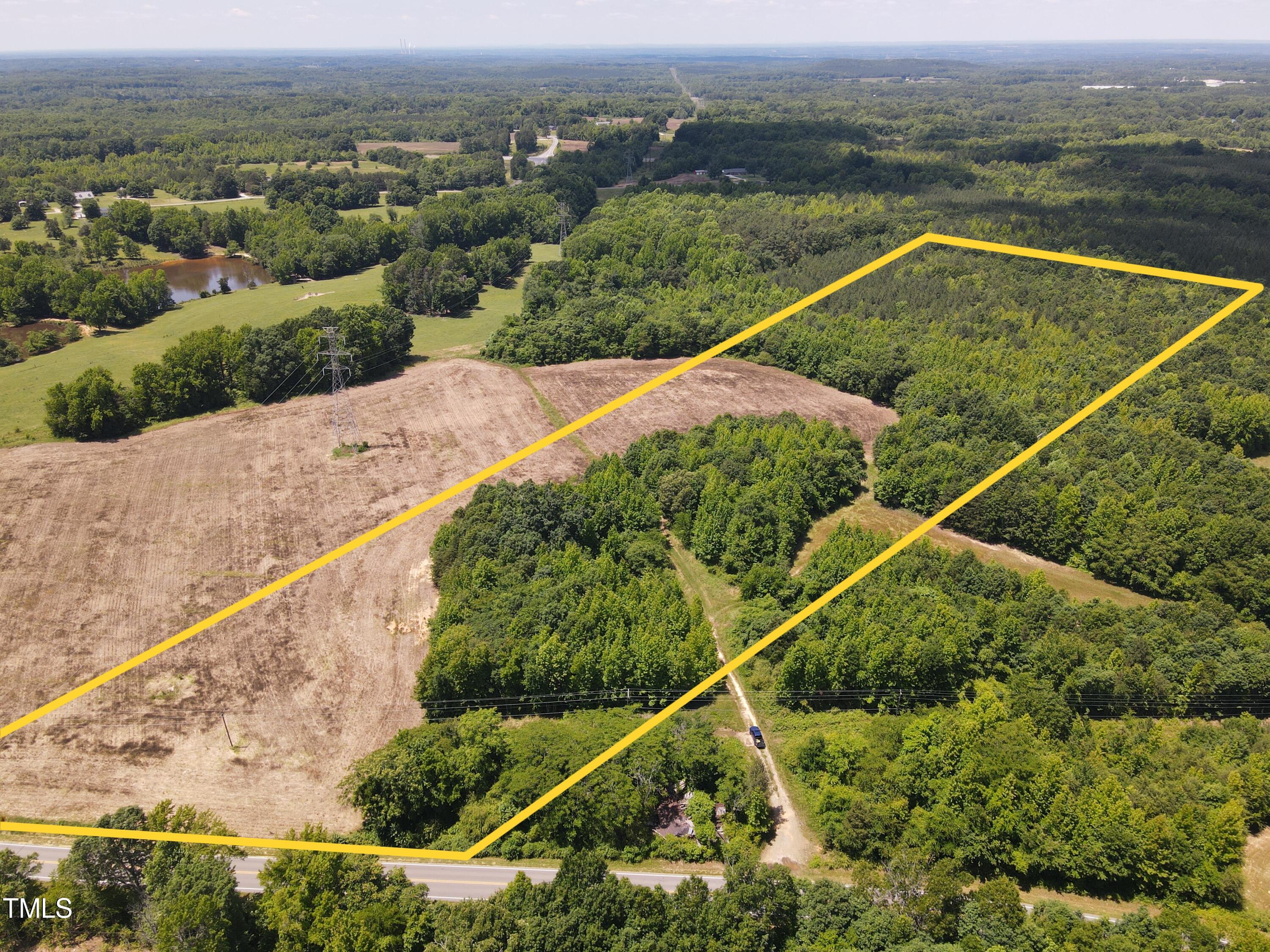 0 Virgilina Road Roxboro, NC 27574 - Photo 11 of 27 an aerial view of a house with a garden