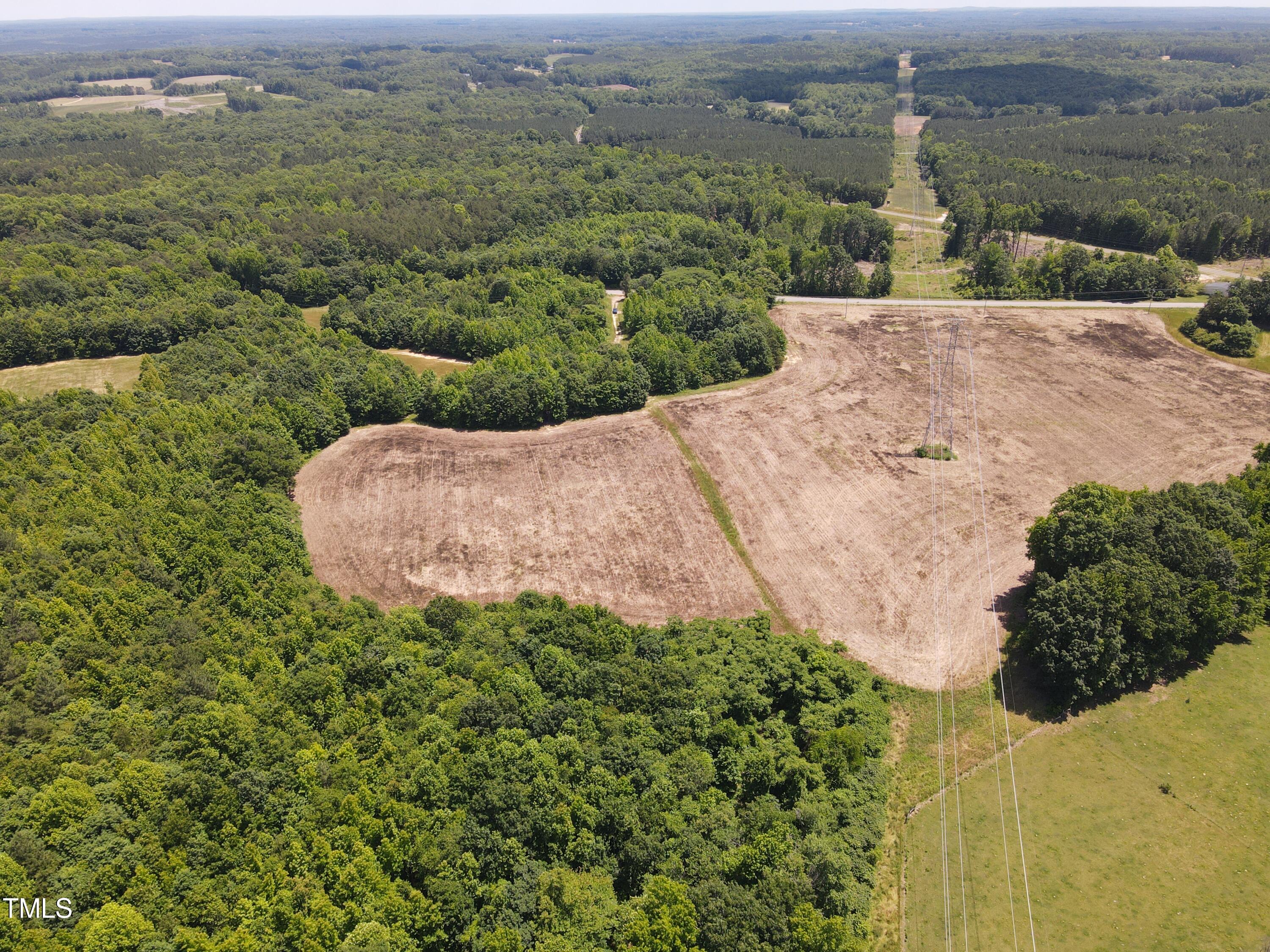 0 Virgilina Road Roxboro, NC 27574 - Photo 16 of 27 an aerial view of a house with a yard