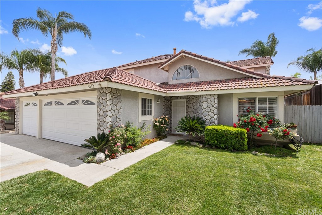 8512 Rosemary Drive Riverside, CA 92508 - Photo 1 of 1 a front view of a house with garden