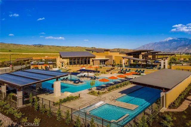 a view of a balcony with an outdoor space and seating area
