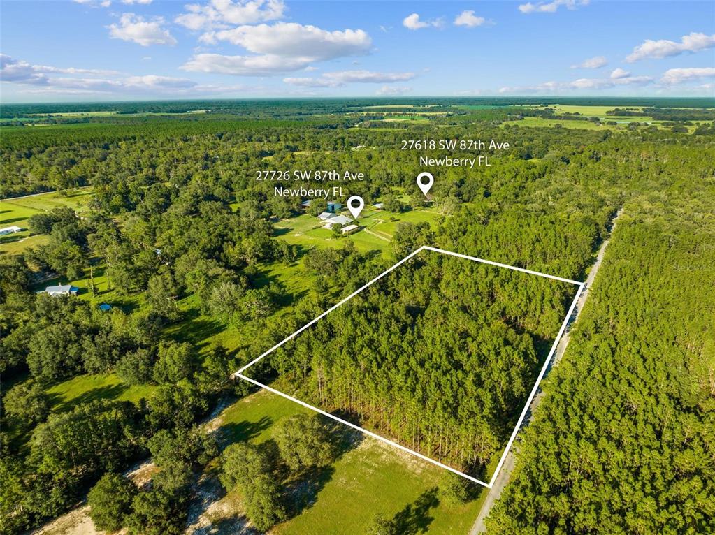0 Southwest 88th Avenue Newberry, FL 32669 - Photo 1 of 1 Over view of the lot and the other two properties that are for sale.