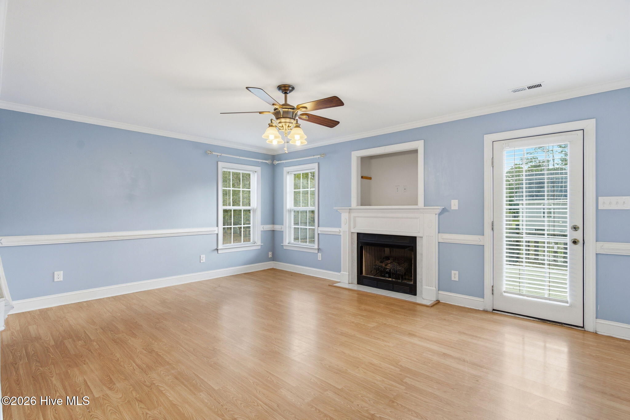 324 Ash Road Southport, NC 28461 - Photo 13 of 34 Family room looking from the kitchen sink