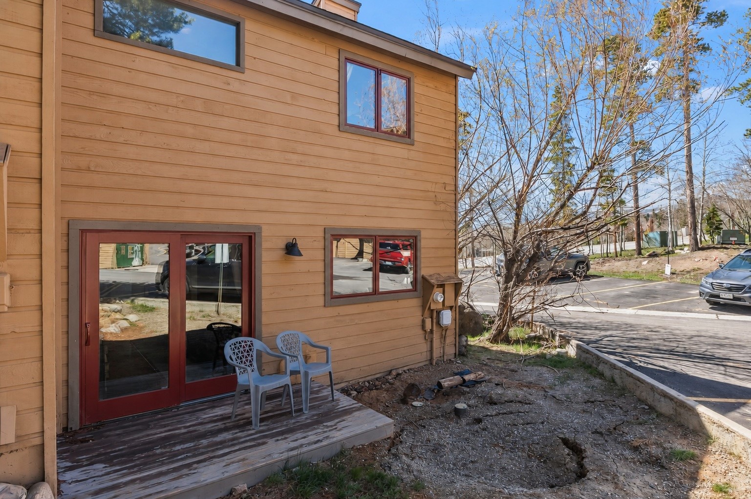 6734 Ryan Gulch Road, Unit 6734 Silverthorne, CO 80498 - Photo 31 of 33 a brick building with a bench in front of it