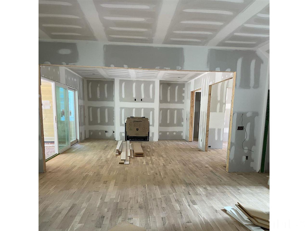 4312 Windsor Place Raleigh, NC 27609 - Photo 4 of 7 a view of livingroom with furniture and staircase
