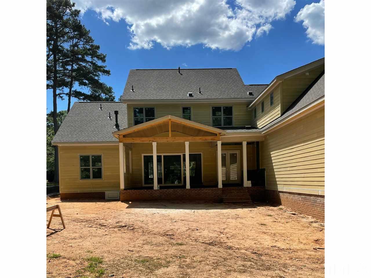 4312 Windsor Place Raleigh, NC 27609 - Photo 6 of 7 a front view of a house with a yard