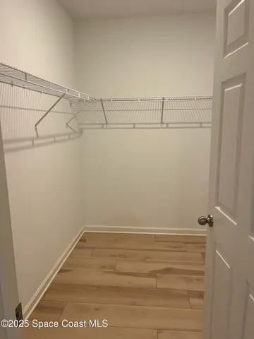 a view of a porch with a floor to ceiling window