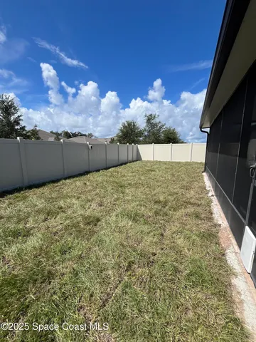 a kitchen with stainless steel appliances a refrigerator stove microwave and sink