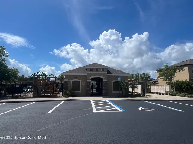 a view of a building with a street