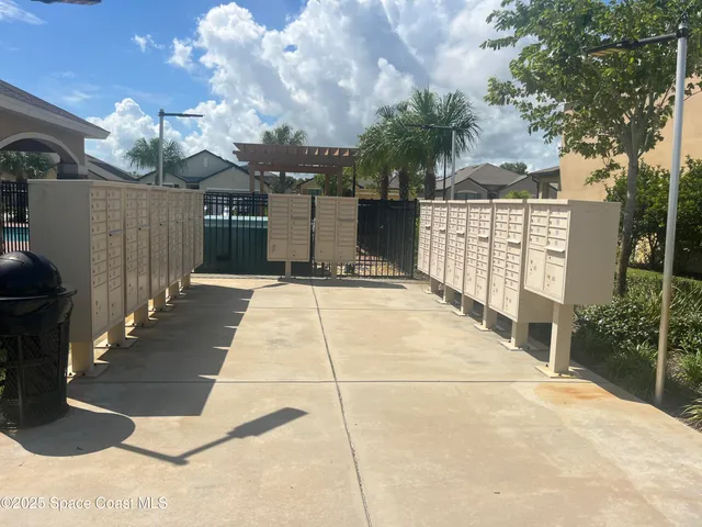 a outdoor space with lots of trees in the background