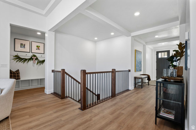 624 North Legend Circle, Unit 480 Mapleton, UT 84664 - Photo 7 of 34 Corridor featuring light wood-style flooring, an upstairs landing, recessed lighting, and beam ceiling