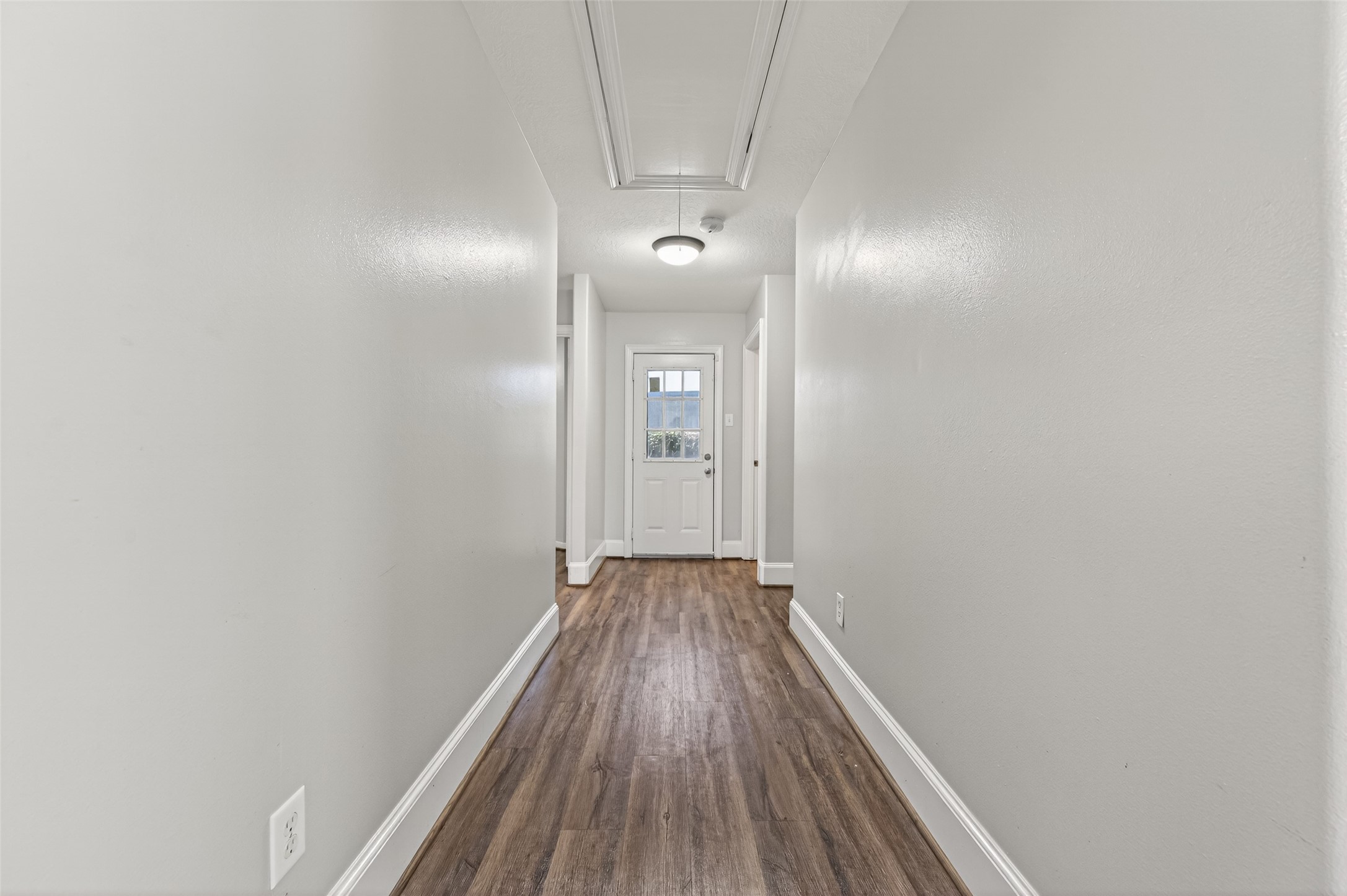 22419 Bridgestone Ridge Drive Spring, TX 77389 - Photo 18 of 48 a view of a hallway with wooden floor