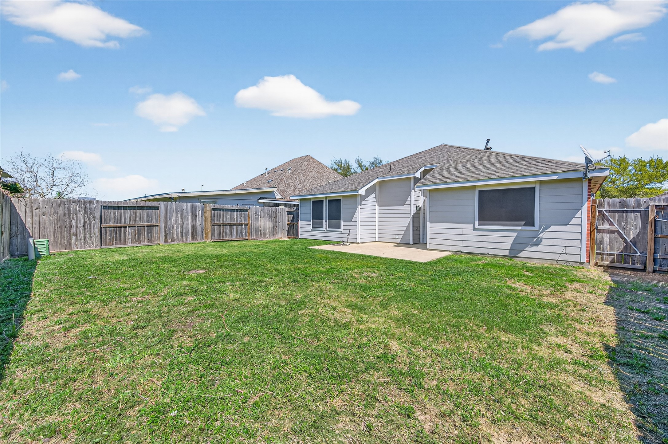 22419 Bridgestone Ridge Drive Spring, TX 77389 - Photo 37 of 48 a front view of a house with a garden
