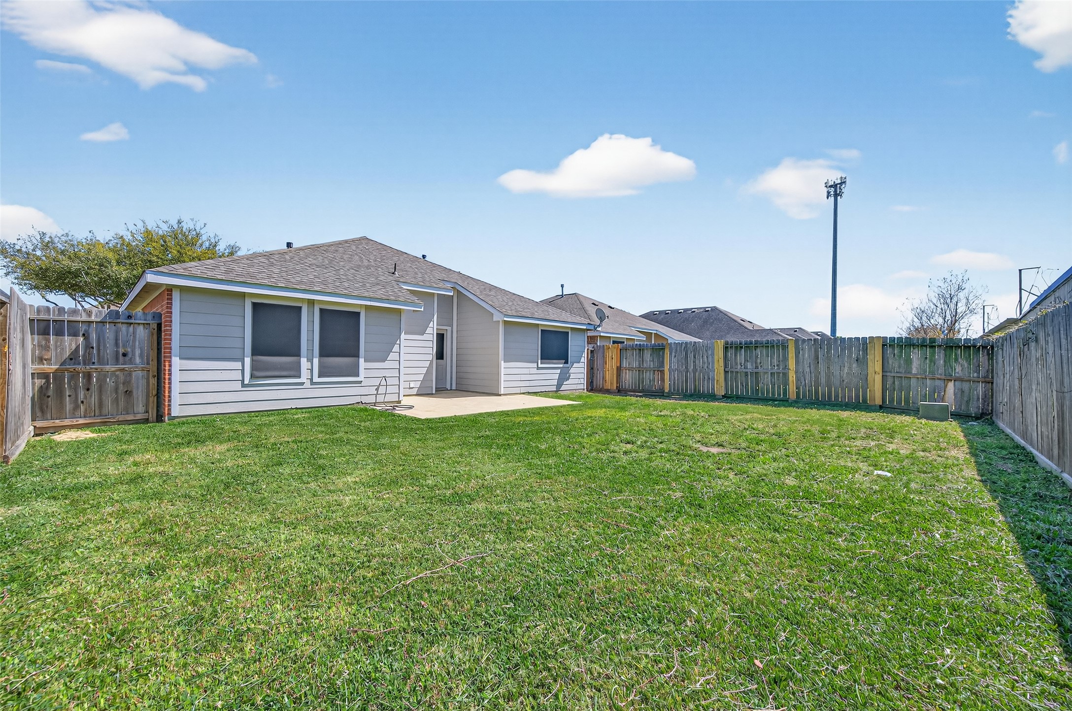 22419 Bridgestone Ridge Drive Spring, TX 77389 - Photo 38 of 48 a view of a house with a backyard