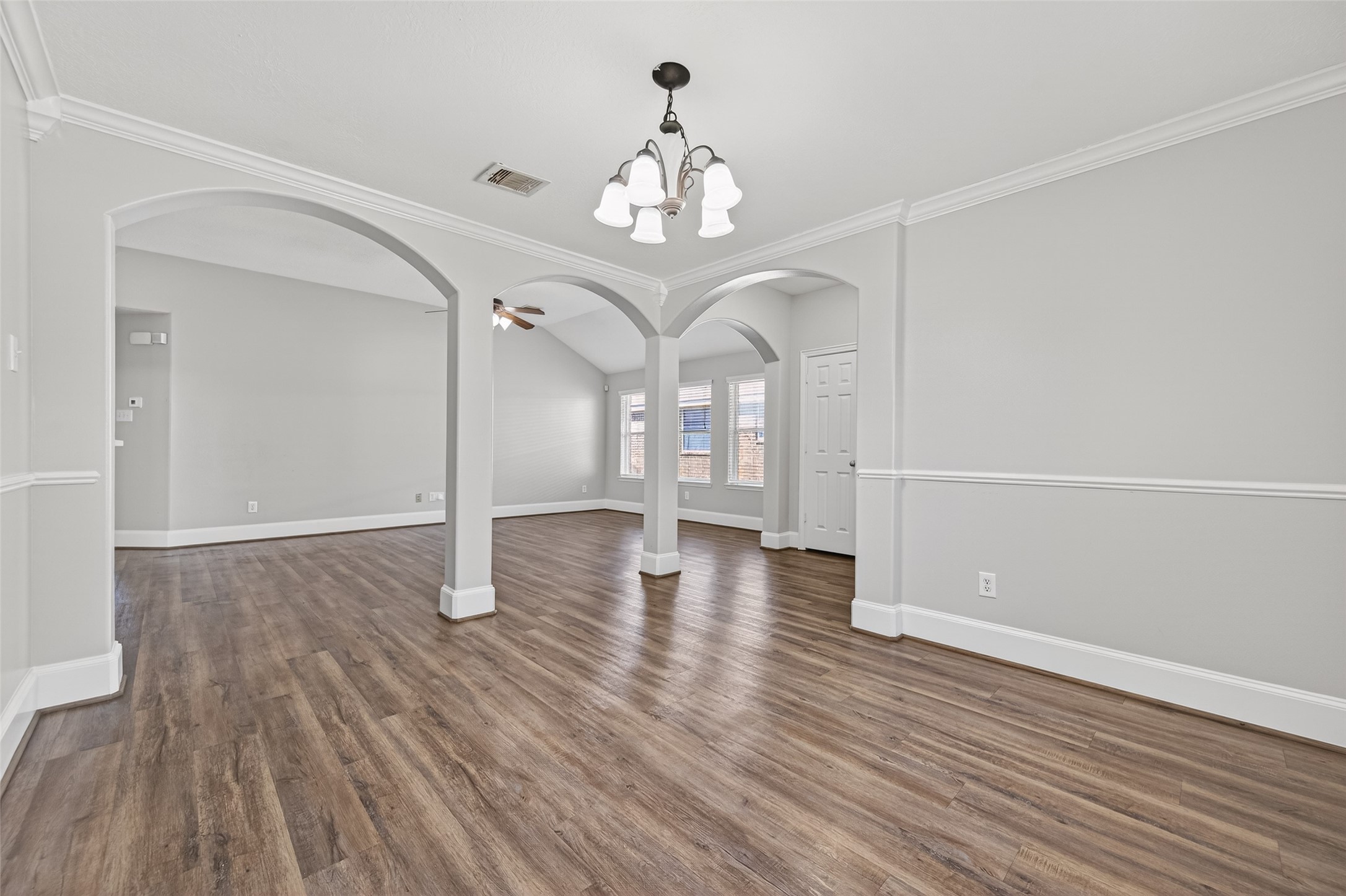 22419 Bridgestone Ridge Drive Spring, TX 77389 - Photo 5 of 48 wooden floor in an empty room with a window