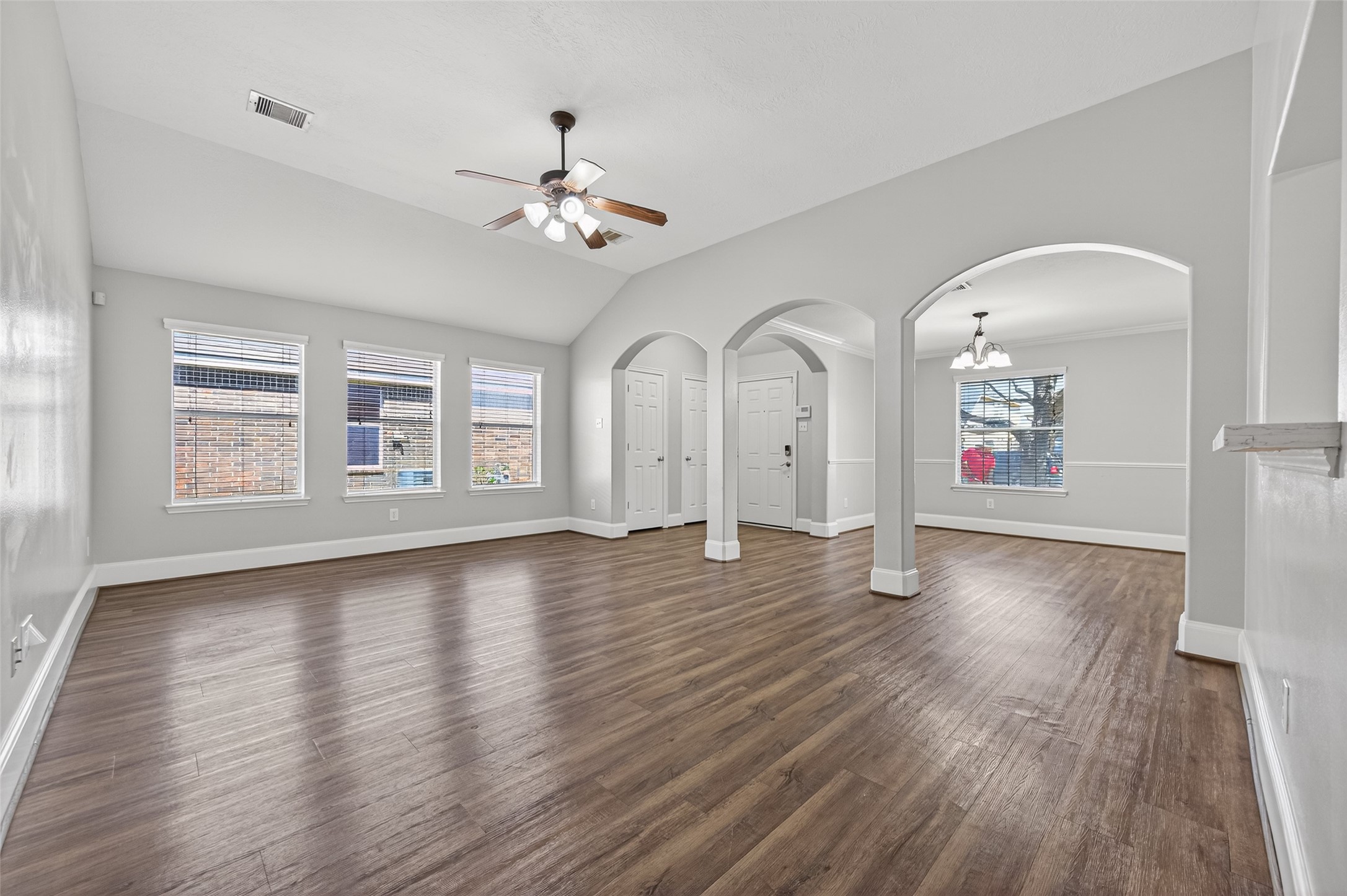 22419 Bridgestone Ridge Drive Spring, TX 77389 - Photo 6 of 48 a view of an empty room with window and wooden floor