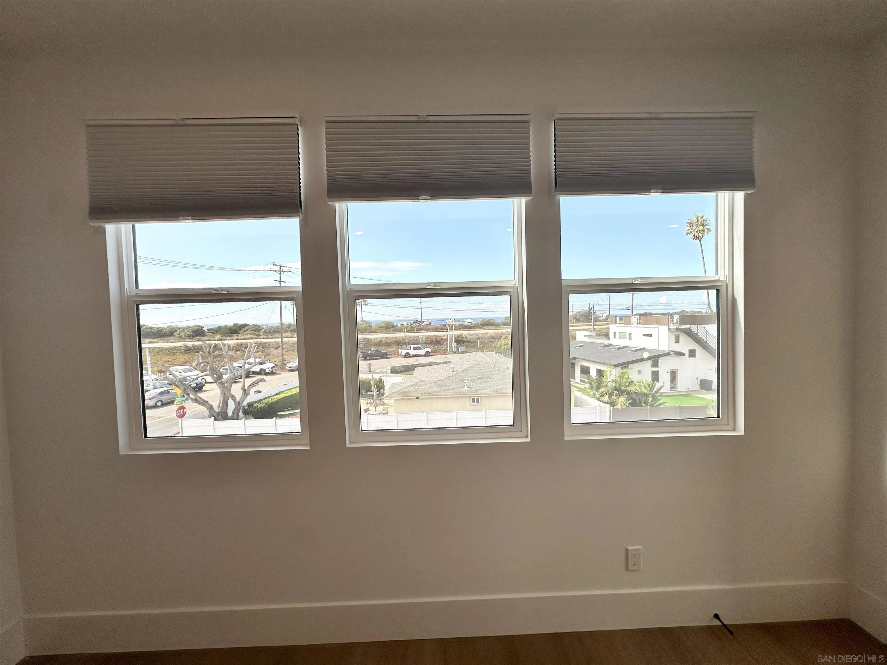 7290 Ponto Drive West, Unit 7132 Carlsbad, CA 92011 - Photo 25 of 44 a view of an empty room with a window