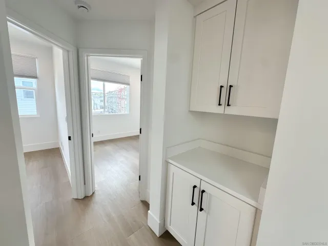 a bathroom with a shower and a bath tub