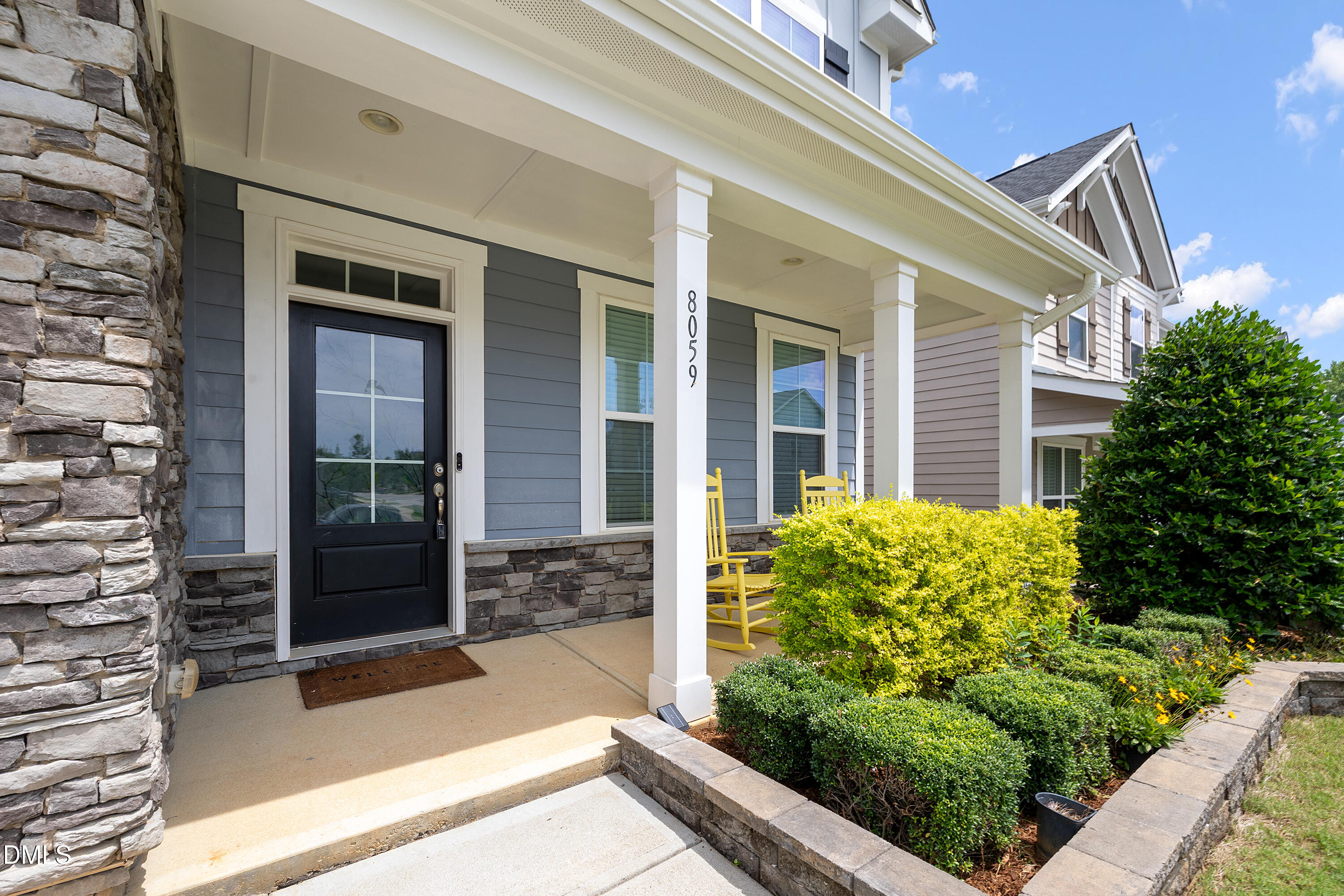 8059 Gilano Drive Raleigh, NC 27603 - Photo 8 of 43 a view of a entryway door front of house