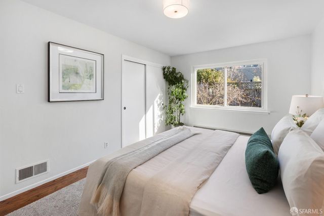 an aerial view of a city with lots of residential buildings