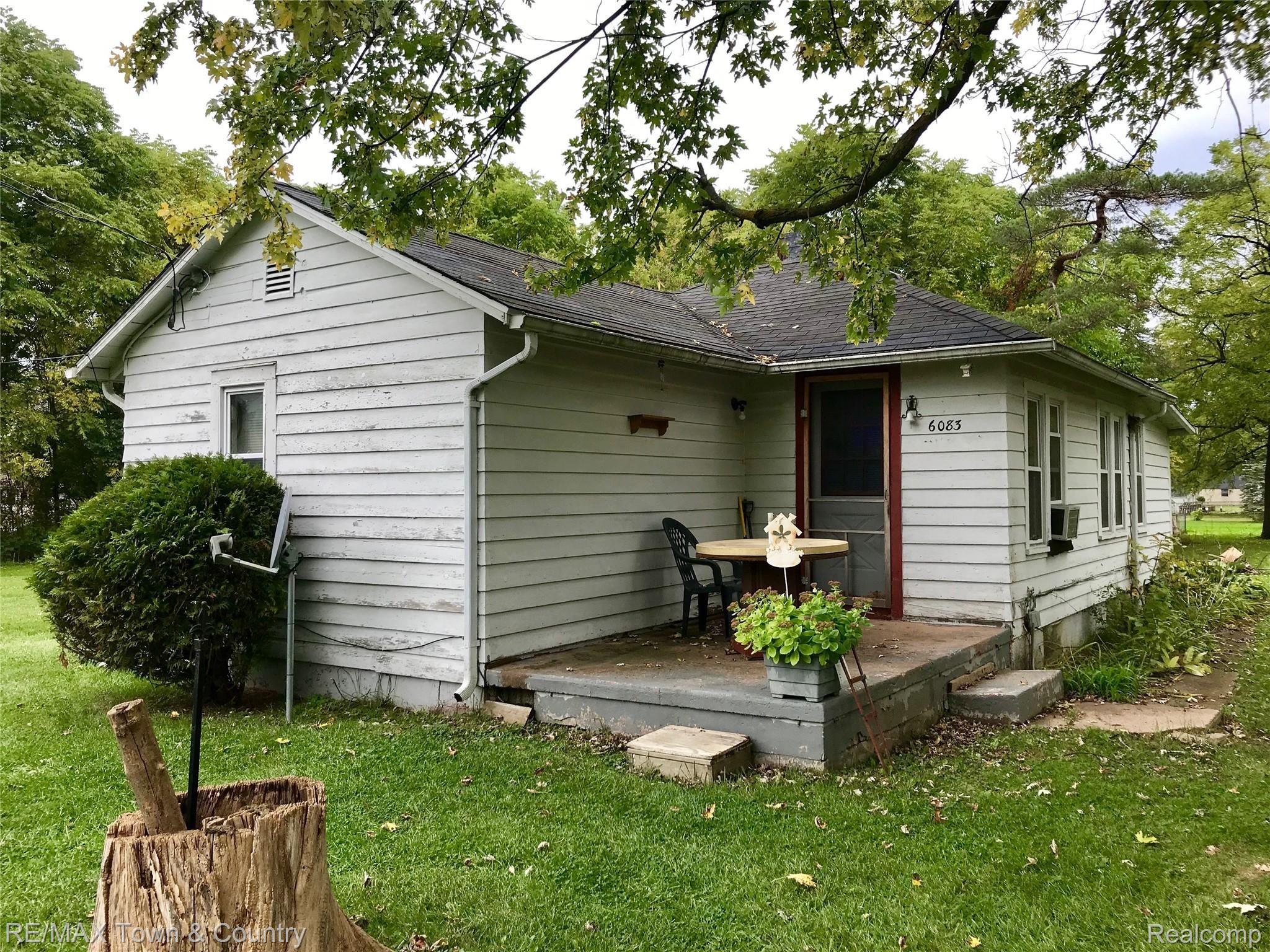 6083 Lapeer Road Burton, MI 48509 - Photo 1 of 21 IMG-9331.jpg