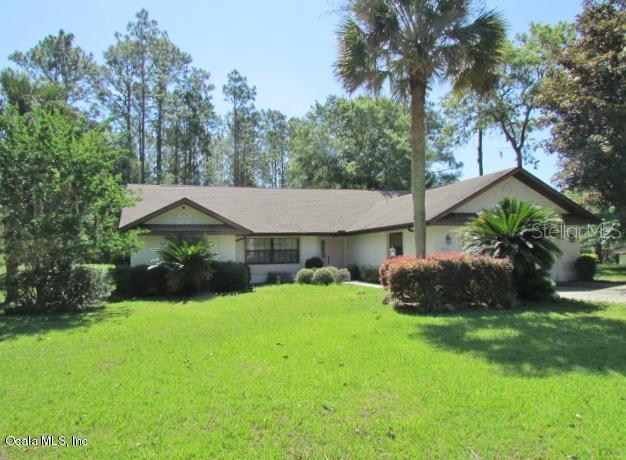 8939 Southwest 213th Ter Road Dunnellon, FL 34431 - Photo 1 of 1 Enchanting 3BR/2BA Woodlands Home