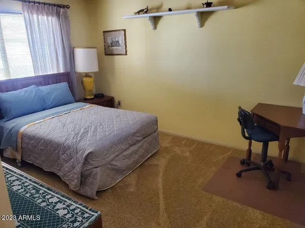 a view of a livingroom with furniture