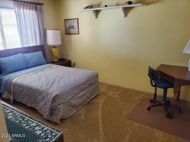 a view of a livingroom with furniture