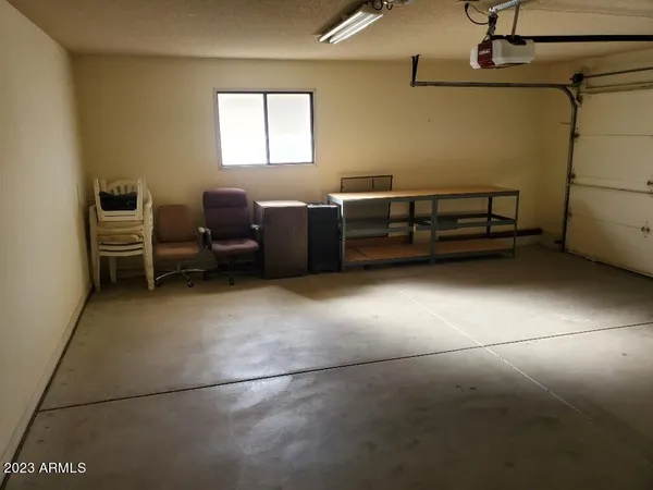 a view of a storage & utility room with closet