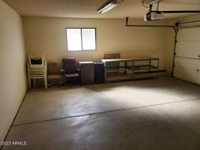 a view of a storage & utility room with closet