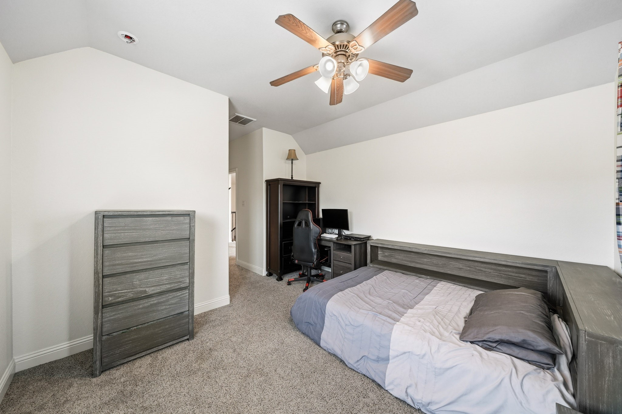 17610 Strackfield Lane Tomball, TX 77377 - Photo 44 of 50 Designed for both comfort and function, this space features natural light and a generous walk-in closet that easily accommodates an extensive wardrobe.