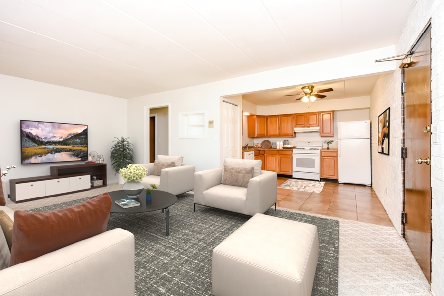 218 East Bailey Road, Unit A Naperville, IL 60565 - Photo 3 of 11 a living room with furniture and a flat screen tv