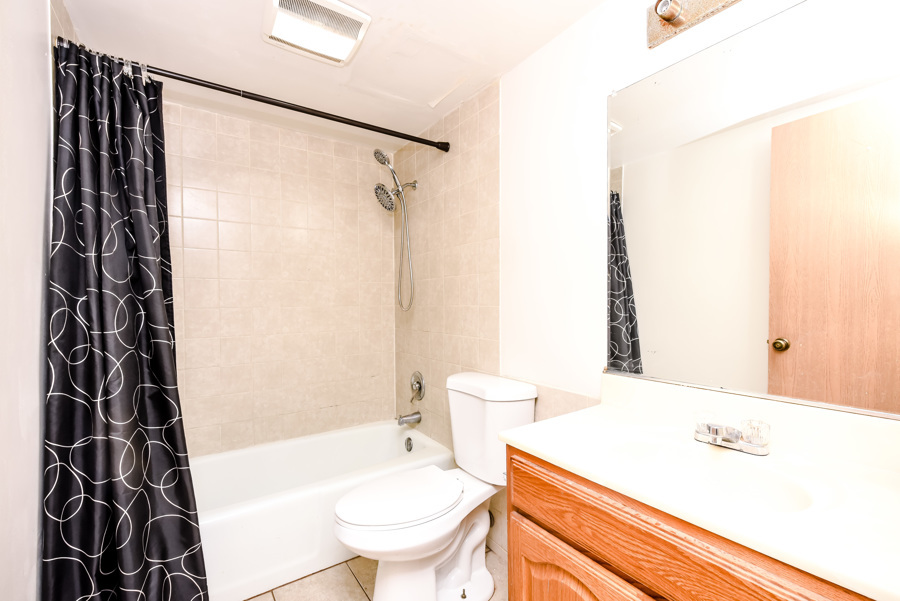 218 East Bailey Road, Unit A Naperville, IL 60565 - Photo 9 of 11 a bathroom with a sink and a mirror
