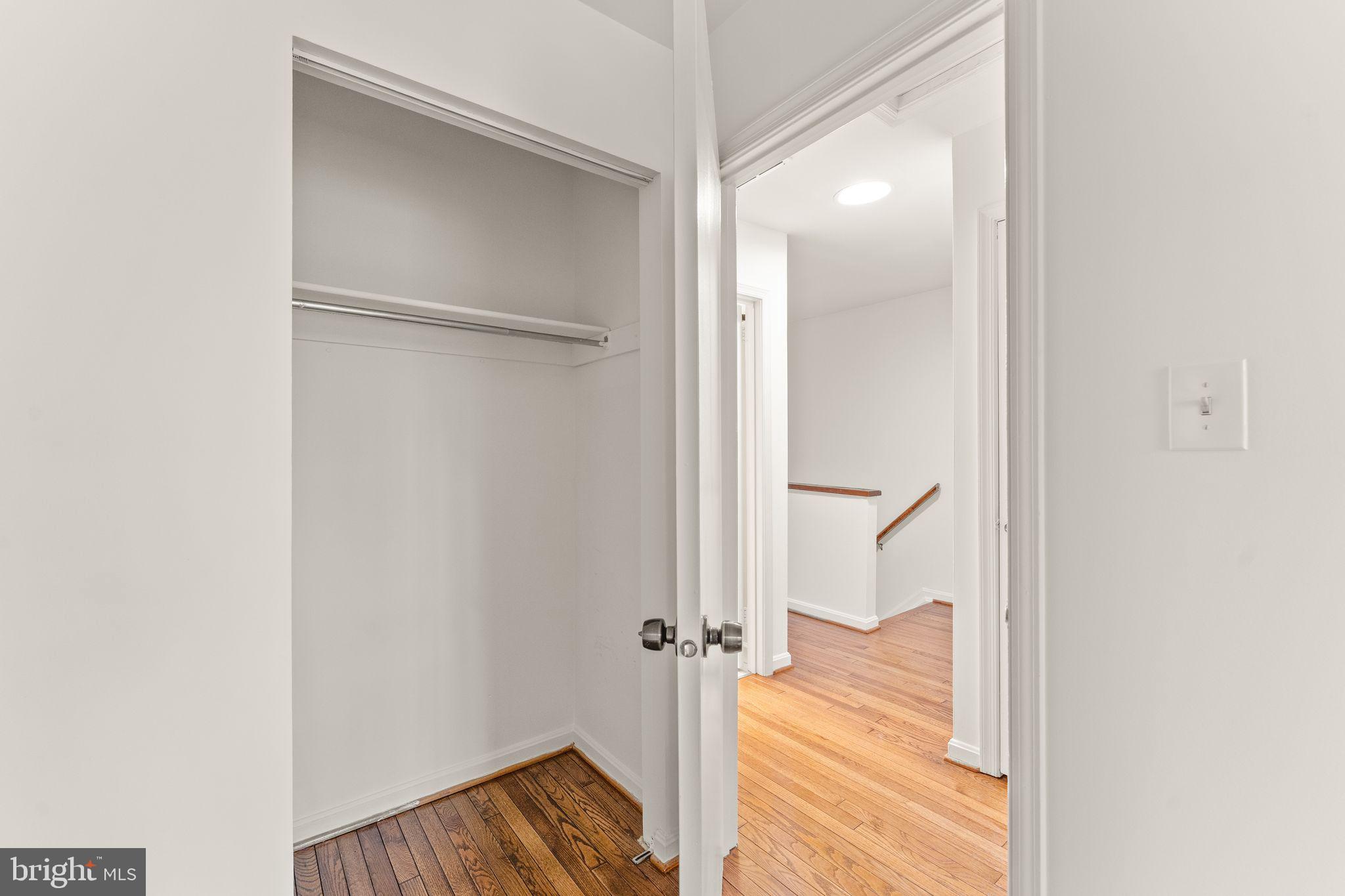 2212 Golf Course Drive Reston, VA 20191 - Photo 31 of 49 a view of a room with wooden floor