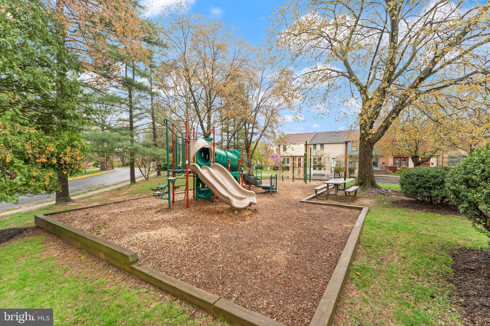 2212 Golf Course Drive Reston, VA 20191 - Photo 43 of 49 a view of a house with backyard porch and sitting area
